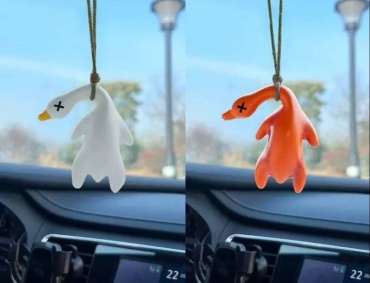 Игрушка гусь
