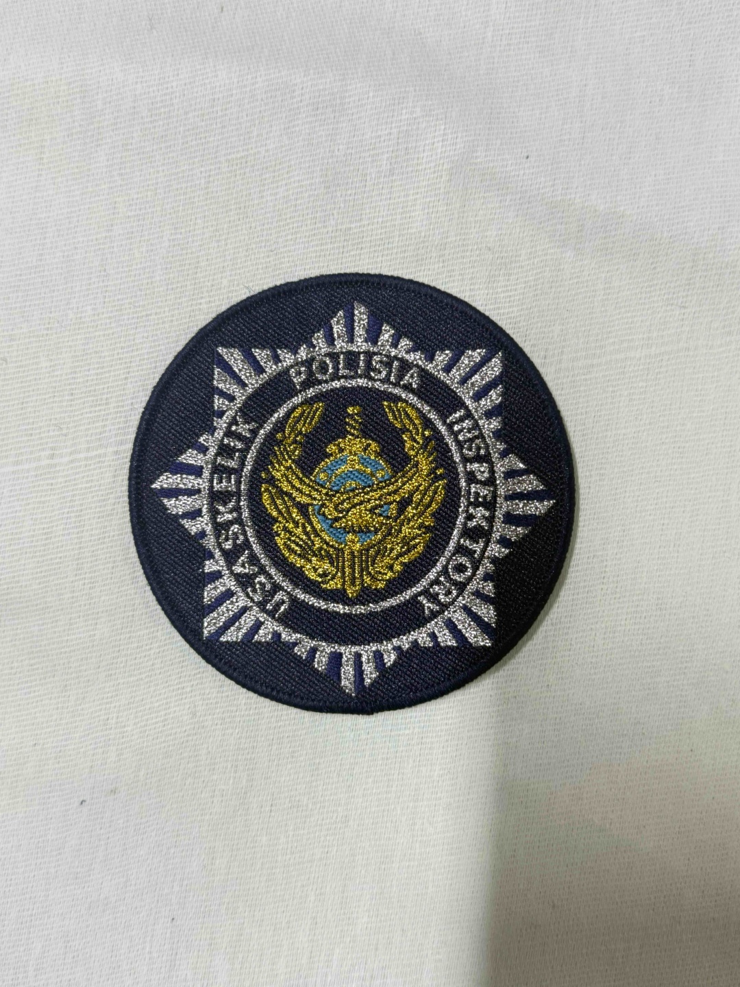 Шеврон Polisia